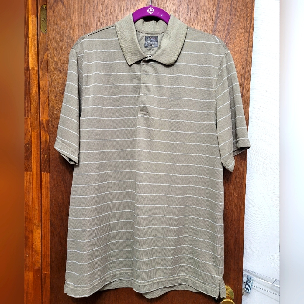 NWOT.  Greg Norman for Tasso Ella Golf shirt.  Size L.  (196)
